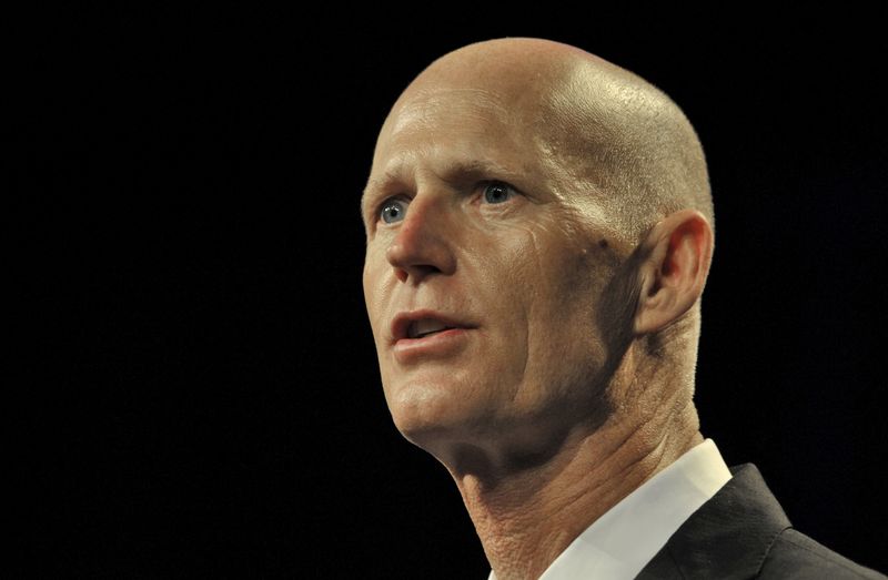 © Reuters. Florida Gov. Scott addresses an economic summit in Orlando