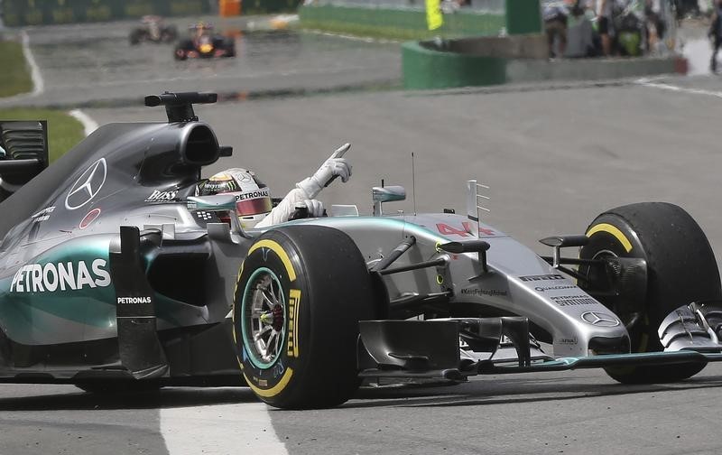 © Reuters. Mercedes driver Lewis Hamilton reacts after winning the Canadian F1 Grand Prix at the Circuit Gilles Villeneuve in Montreal 