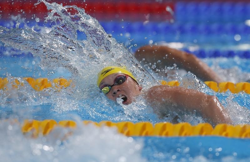 © Reuters. Palmer of Australia competes in the women's 200m freestyle heats during the World Swimming Championships in Barcelona