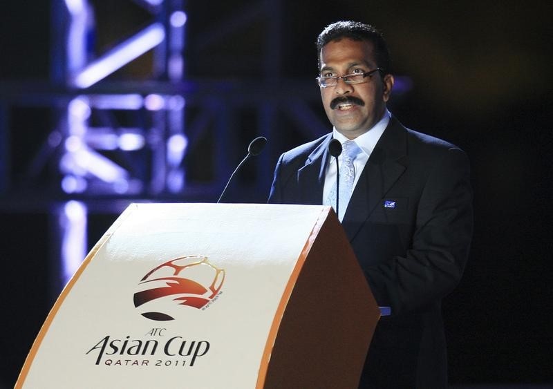 © Reuters. AFC General Secretary Alex Soosay speaks at the Qatar 2011 AFC Asian Cup mascot launching ceremony in Doha