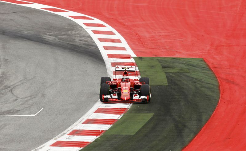© Reuters. Ferrari Formula One driver Raikkonen of Finland steers his car during the qualifying session for the Austrian F1 Grand Prix in Spielberg