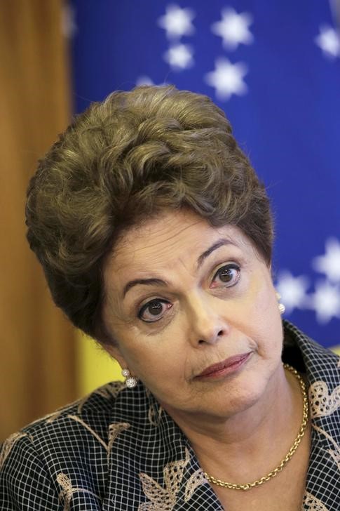 © Reuters. Brazil's President Dilma Rousseff reacts during a meeting with South Korea's President Park Geun-hye (not pictured) at the Planalto Palace in Brasilia