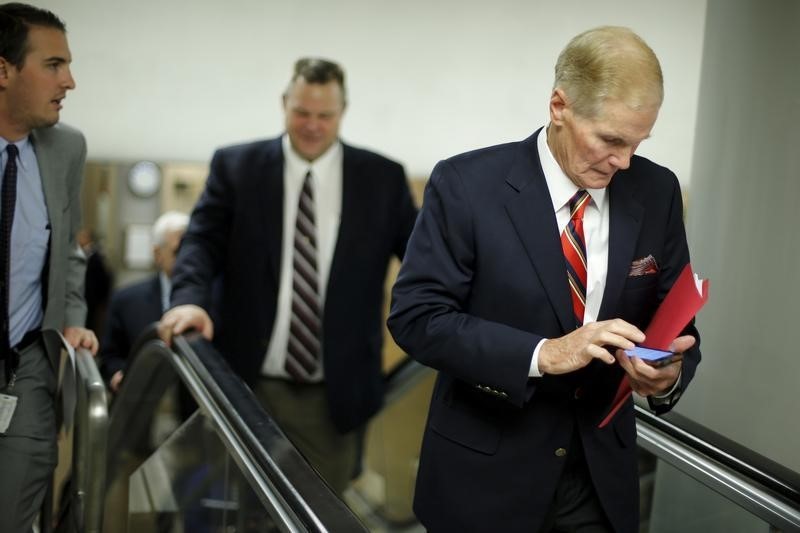 © Reuters. Nelson arrives in the underground subway system for a vote at the U.S. Capitol in Washington