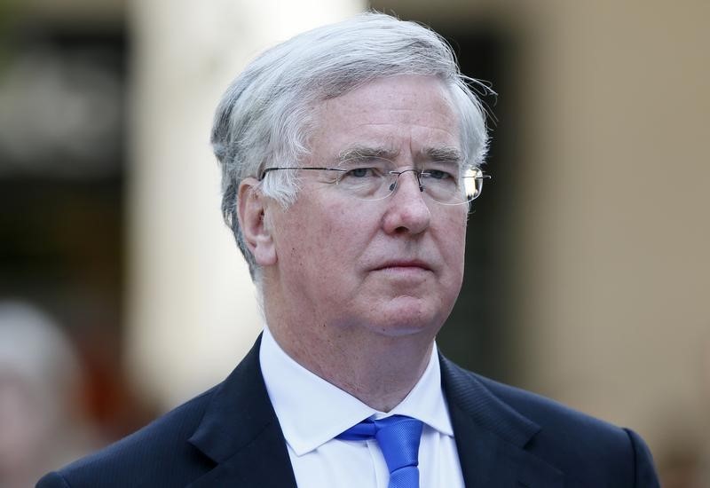 © Reuters. Britain's Defence Secretary Fallon arrives to attend a national service of commemoration to mark the 200th anniversary of the Battle of Waterloo at St Paul's Cathedral in central London