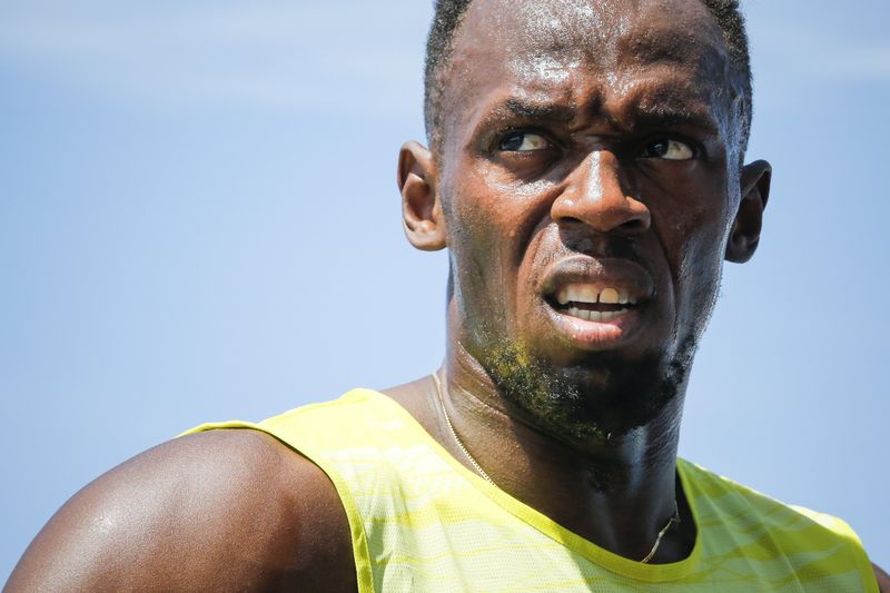 © Reuters. Bolt of Jamaica reacts after winning the 200m at the IAAF Diamond League Grand Prix track and field competition in New York