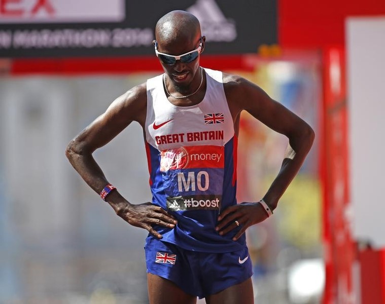 © Reuters. Mo Farah of Britain reacts after finishing in eighth position in the men's Elite London Marathon
