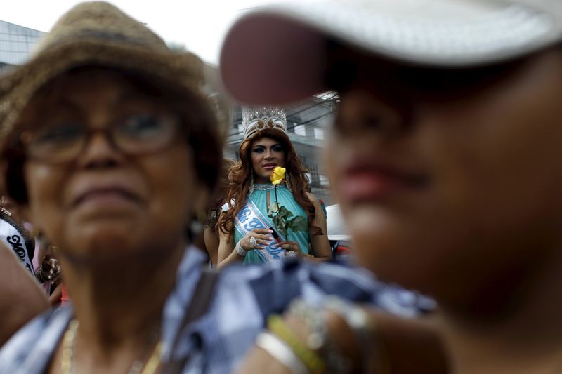 © Reuters. Reveler is seen as he takes part in a Gay Pride parade in Panama City