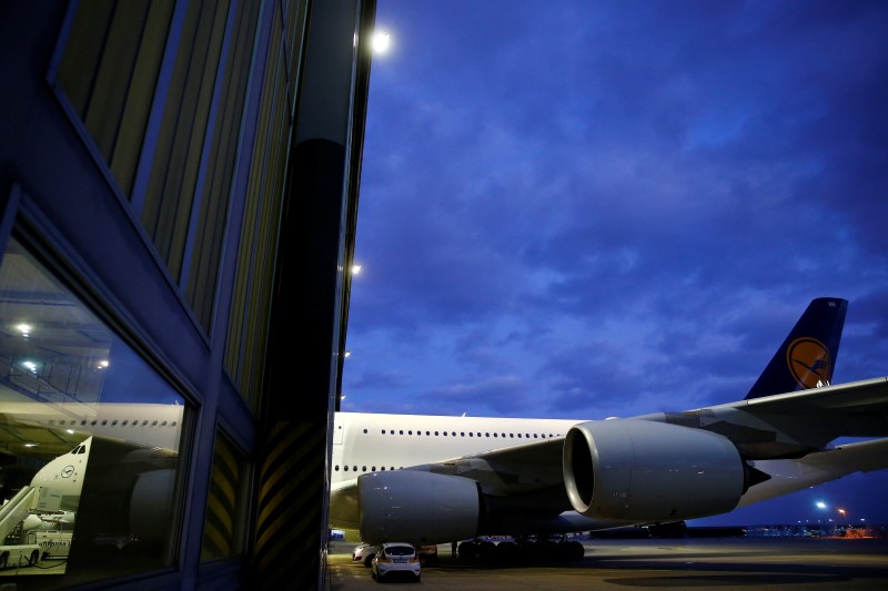 © Reuters. An A380 aircraft stands half inside a hanger at the Lufthansa Technik facility in Frankfurt