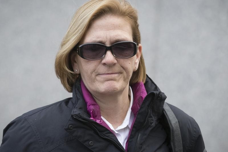 © Reuters. Crupi, former portfolio manager for Bernard L. Madoff Investment Securities LLC, exits the Manhattan Federal Court house in New York