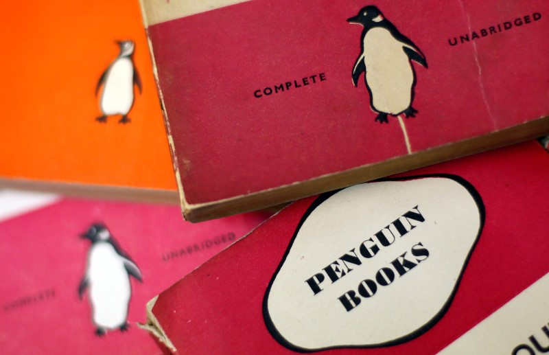 © Reuters. Penguin books are seen in a used bookshop in central London