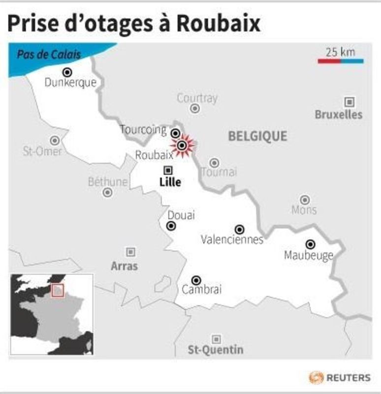 © Reuters. PRISE D'OTAGES À ROUBAIX