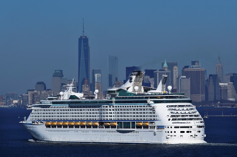 © Reuters. New York skyline is seen in a distance as Royal Caribbean's Explorer of the Seas enters New York harbour