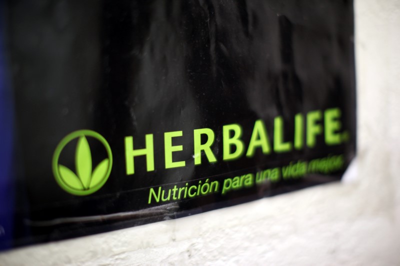© Reuters. A Herbalife logo is shown on a poster at a clinic in the Mission District in San Francisco