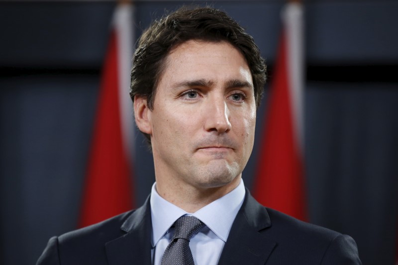 © Reuters. رئيس وزراء كندا:هجمات باريس كانت سببا لابطاء تدفق مهاجرين سوريين