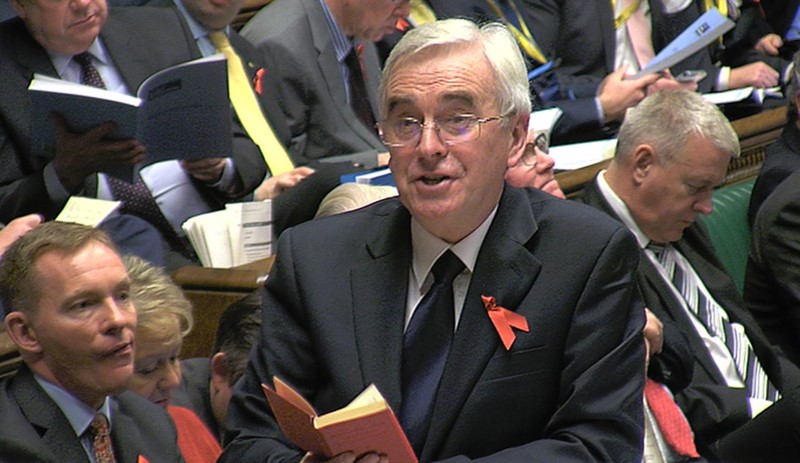 © Reuters. A still image from video shows Britain's shadow Chancellor of the Exchequer John McDonnell quoting from Mao's Little Red Book