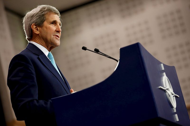 © Reuters. Kerry holds a news conference at the NATO ministerial meetings at NATO Headquarters in Brussels