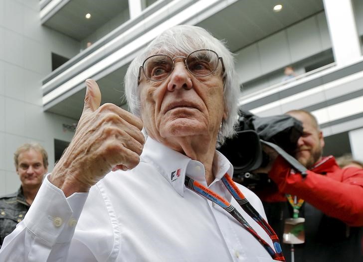 © Reuters. Formula One supremo Ecclestone speaks to the media at the paddock area ahead of the Russian F1 Grand Prix in Sochi