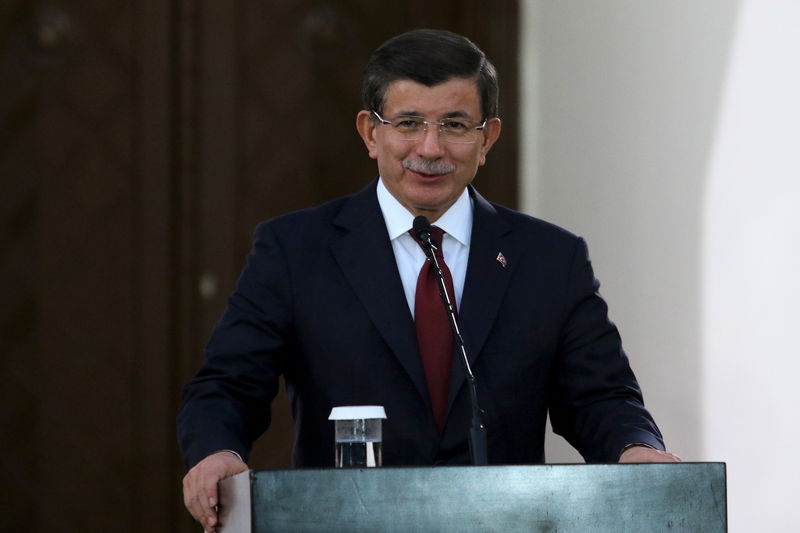 © Reuters. Turkish Prime Minister Ahmet Davutoglu  speaks to the media during a visit to northern Cyprus