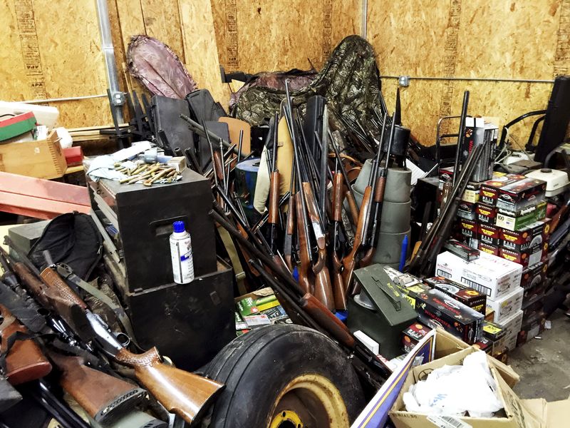 © Reuters. Stacks of guns are seen in a garage belonging to Brent Nicholson in Pageland, South Carolina