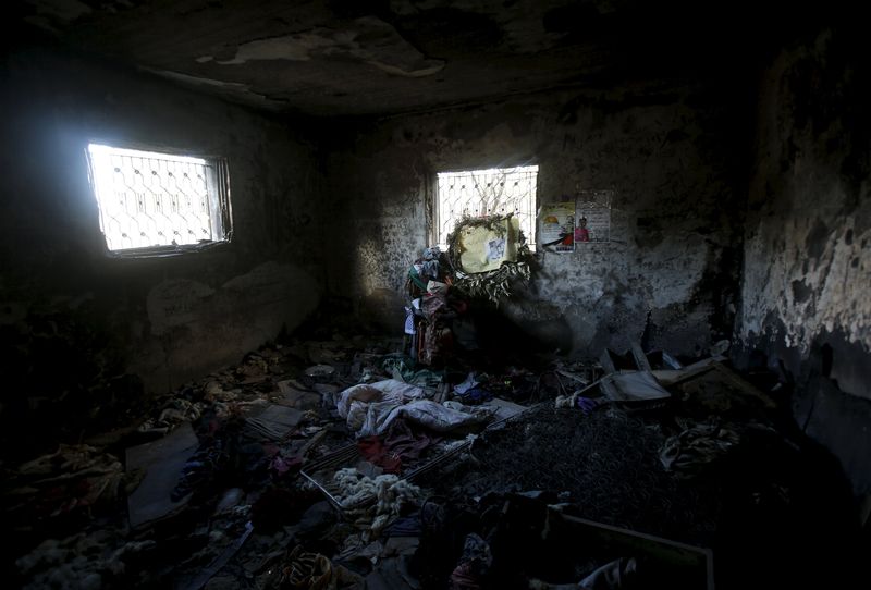 © Reuters. The interior of the torched house of the Dawabsheh family is seen at Duma village near the West Bank city of Nablus