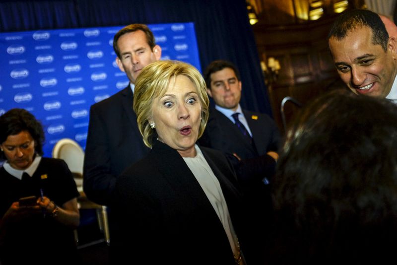 © Reuters. U.S. Democratic presidential candidate and former Secretary of State Hillary Clinton greets supporters after delivering the keynote address at the Brookings Institution Saban Forum at the Willard Hotel in Washington