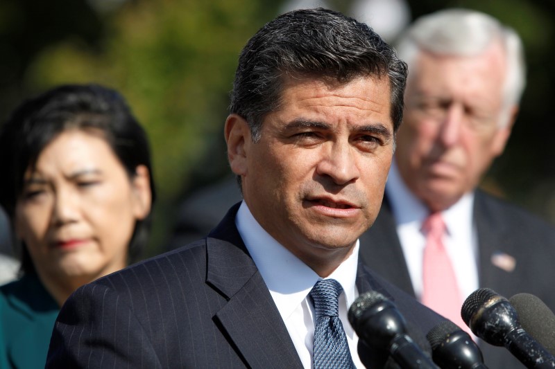 © Reuters. Becerra leads fellow House Democrats at a news conference to call for a vote on immigration reform legislation, at the U.S. Capitol in Washington