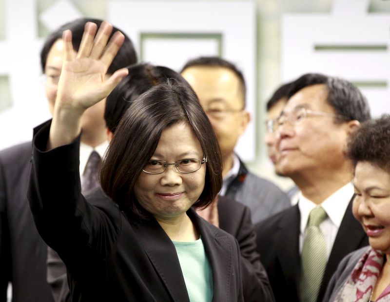 © Reuters. File photo shows Taiwan's main opposition Democratic Progressive Party (DPP) Chairperson Tsai Ing-wen waving to reporters after speaking during a news conference in Taipei