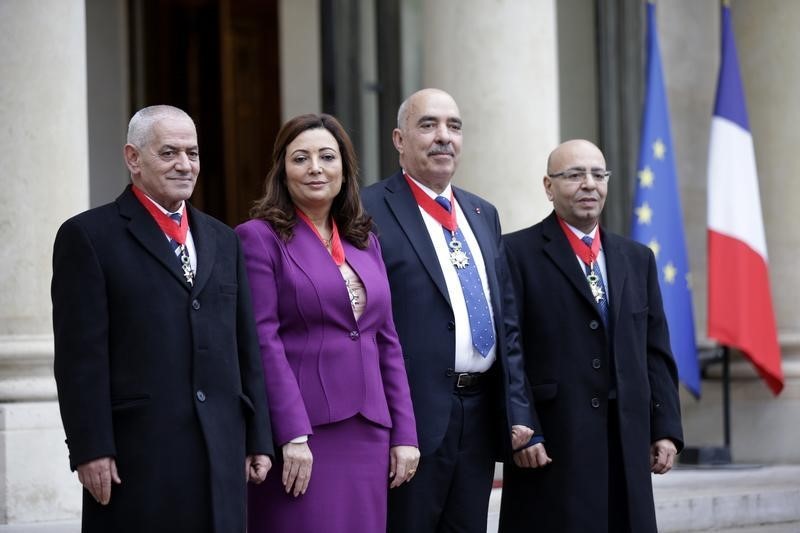 © Reuters. التونسيون الفائزون بجائزة نوبل يدعون للسلام في ليبيا وسوريا