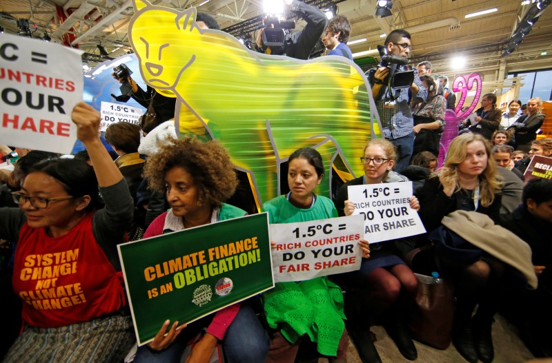 © Reuters. TROIS GRANDS POINTS RESTENT À TRANCHER À LA COP21