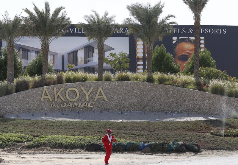 © Reuters. A view shows the signboard after the removal of the Trump International Golf Club portion at the AKOYA by DAMAC development in Dubai