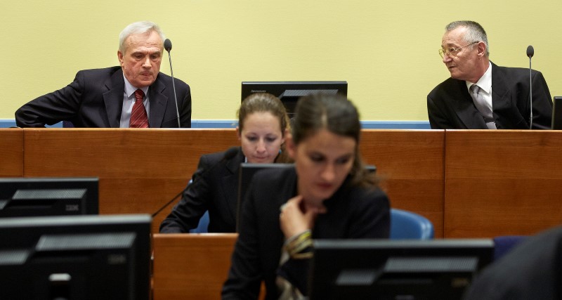 © Reuters. Franko Simatovic and Jovica Stanisic sit in the courtroom prior to the Trial Chamber Judgement at the International Criminal Tribunal for the former Yugoslavia in the Hague