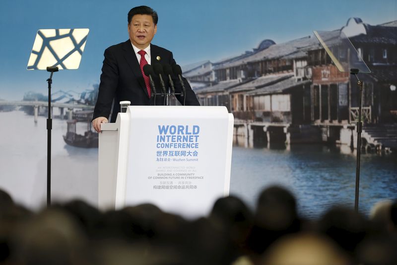 © Reuters. China's President Xi Jinping speaks during the opening ceremony of the 2nd annual World Internet Conference in Wuzhen town