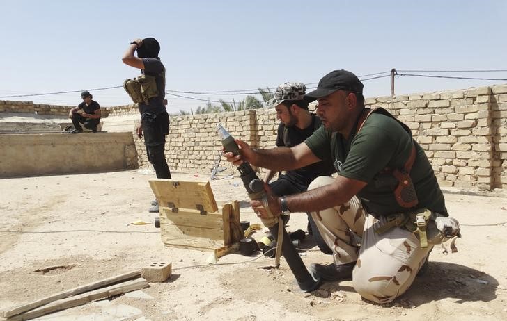 © Reuters. وزارة الدفاع العراقية: الدولة الإسلامية تمنع سكان الرمادي من الرحيل