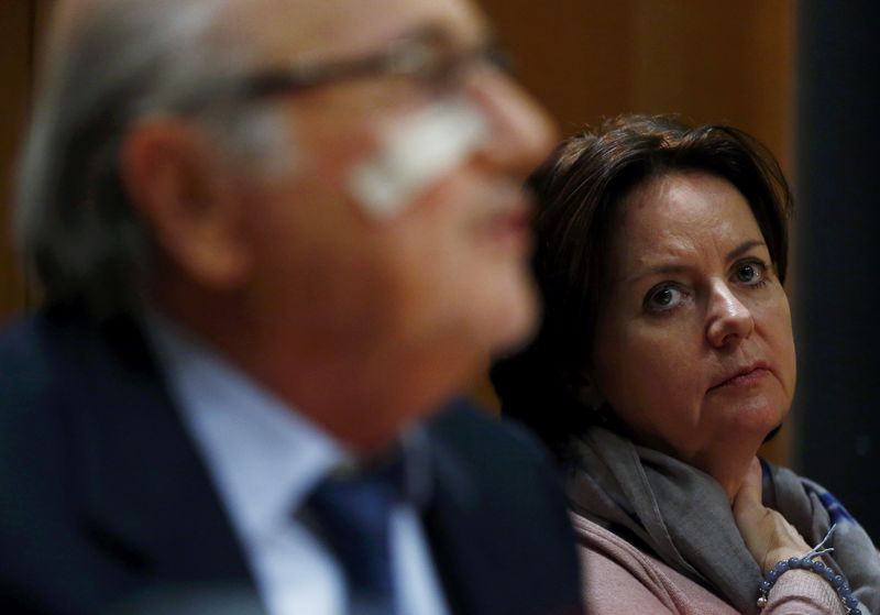 © Reuters. Corinne daughter of FIFA's suspended president Blatter pauses next to her father during a news conference in Zurich