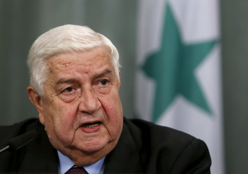 © Reuters. Syrian Foreign Minister Walid al-Moualem attends a news conference in Moscow