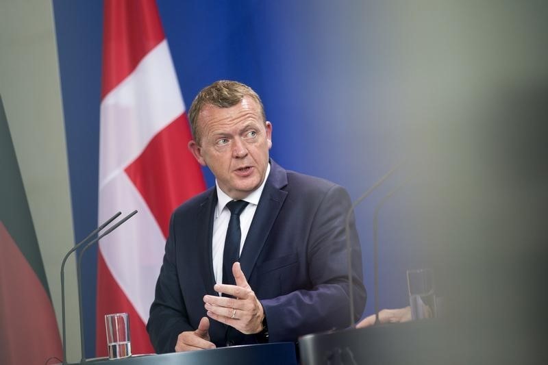 © Reuters. Danish Prime Minister Lars Lokke Rasmussen attends a press conference at the chancellery in Berlin