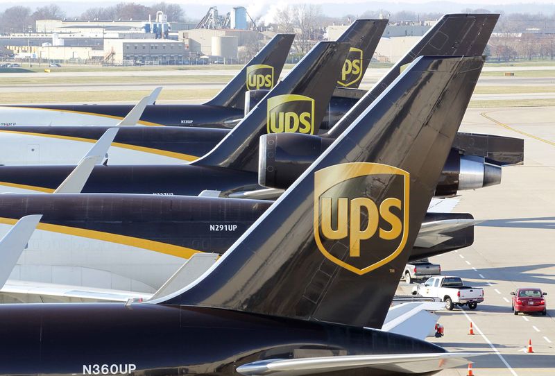 © Reuters. United Parcel Service air craft are being loaded with air containers full of packages bound for their final destination at the UPS Worldport All Points International Hub during the peak delivery month in Louisville in this file photo