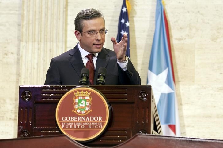 © Reuters. Puerto Rico's Governor Padilla delivers his state of the Commonwealth address at the Capitol building in San Juan, Puerto Rico