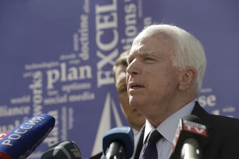 © Reuters. McCain speaks during the inauguration ceremony of the NATO StratCom COE in Riga