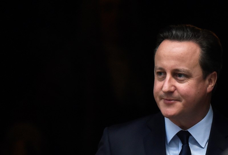 © Reuters. Britain's Prime Minister David Cameron leaves Number 10 Downing Street to attend Prime Minister's Questions at parliament in London