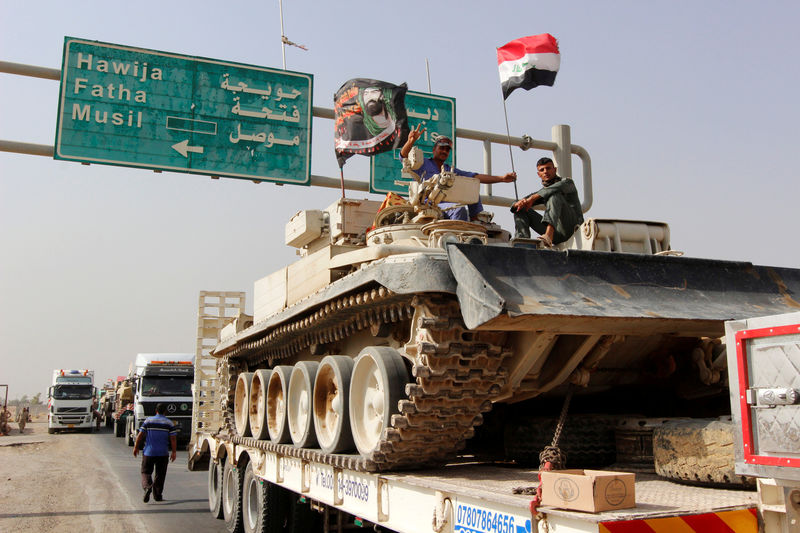 © Reuters. وكالة: مقاتلون دربتهم تركيا سيشاركون في عملية الموصل