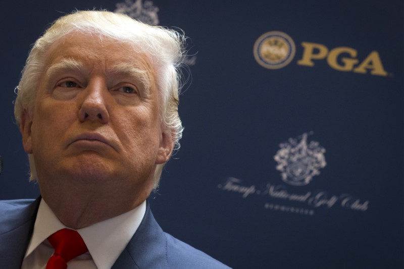 © Reuters. Real estate developer Donald Trump attends a news conference with the PGA in New York