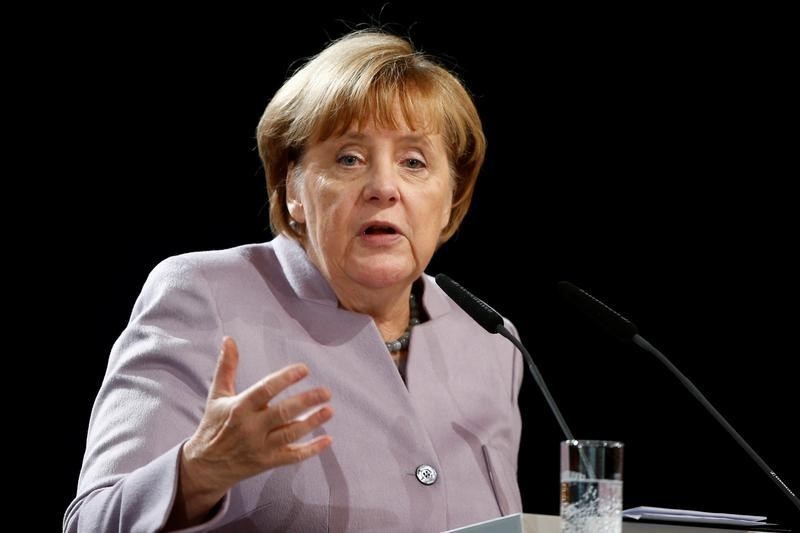 © Reuters. German Chancellor Angela Merkel attends a meeting of the Christian Democratic Seniors Union in Magdeburg