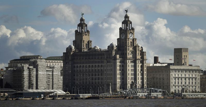 © Reuters. Liverpool's iconic waterfront property the Royal Liver building is viewed across the River Mersey in Birkenhead , northern England