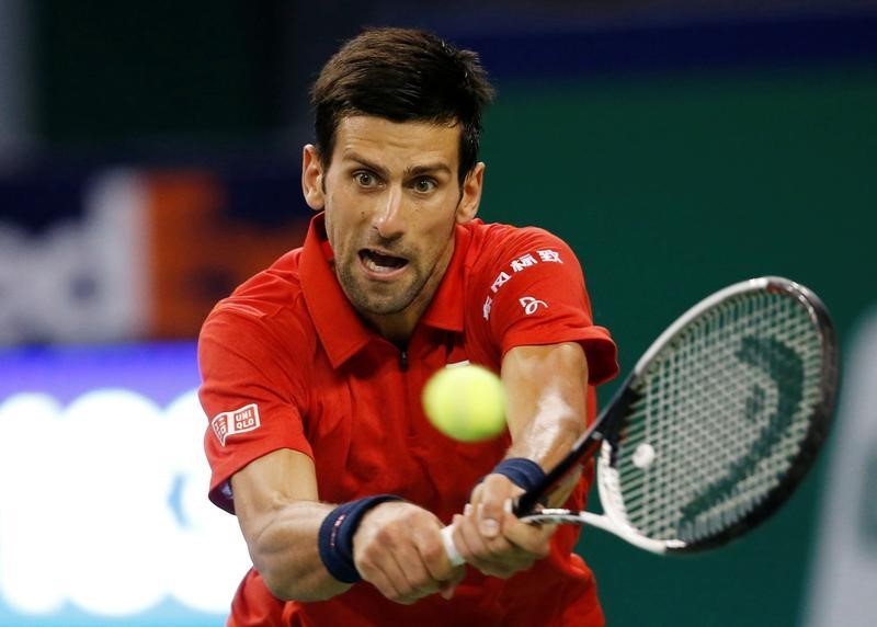 © Reuters. Tennis - Shanghai Masters tennis tournament - Novak Djokovic of Serbia v Roberto Bautista Agut of Spain