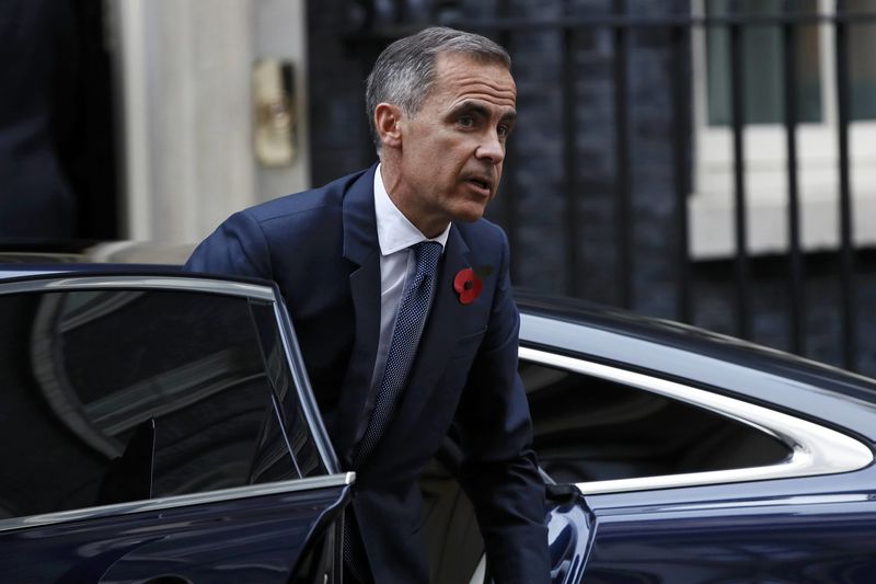 © Reuters. Bank of England governor Mark Carney arrives at Number 10 Downing Street in central London