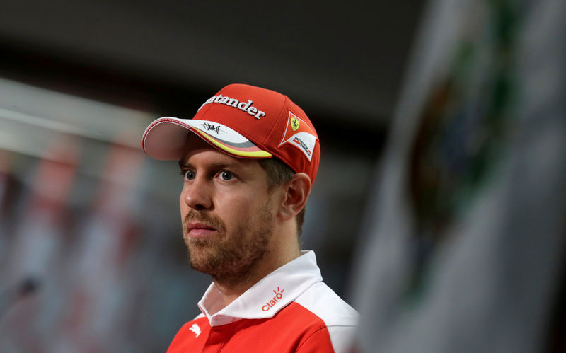 © Reuters. Ferrari Formula One driver Vettel of Germany attends a news conference