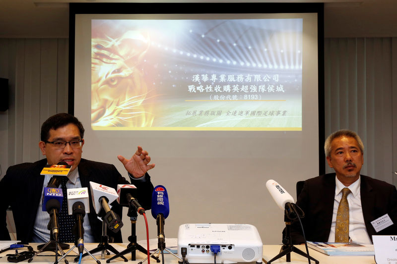 © Reuters. David Yip of GreaterChina Professional Services Limited speaks during a news conference about a proposed acquisition of English Premier League Hull City A.F.C. in Hong Kong