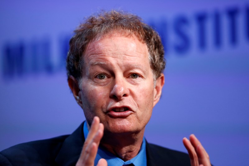 © Reuters. John Mackey, Co-Founder and Co-CEO of Whole Foods Market, speaks at the Milken Institute Global Conference in Beverly Hills