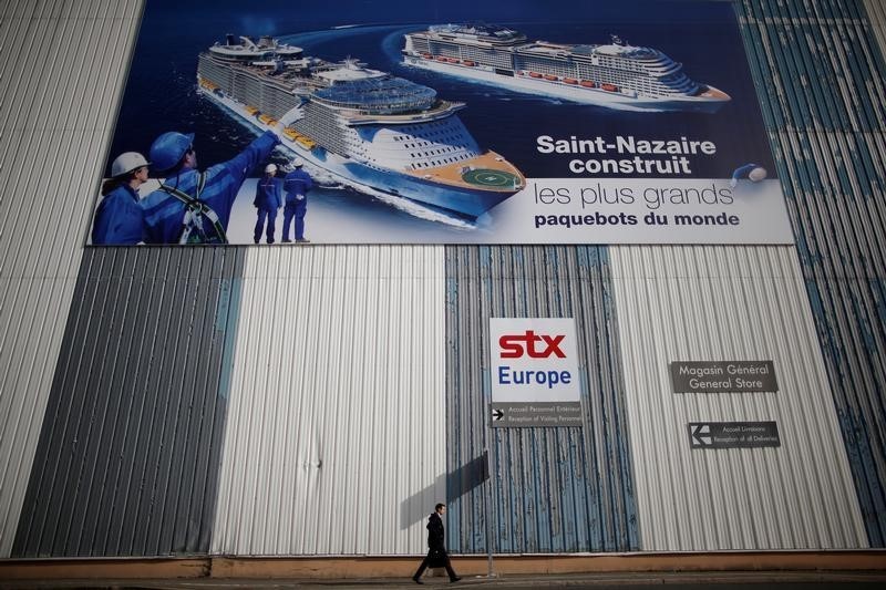 © Reuters. DOSSIER STX: LA FRANCE AVERTIT SÉOUL QU'ELLE DÉFENDRA SES INTÉRÊTS